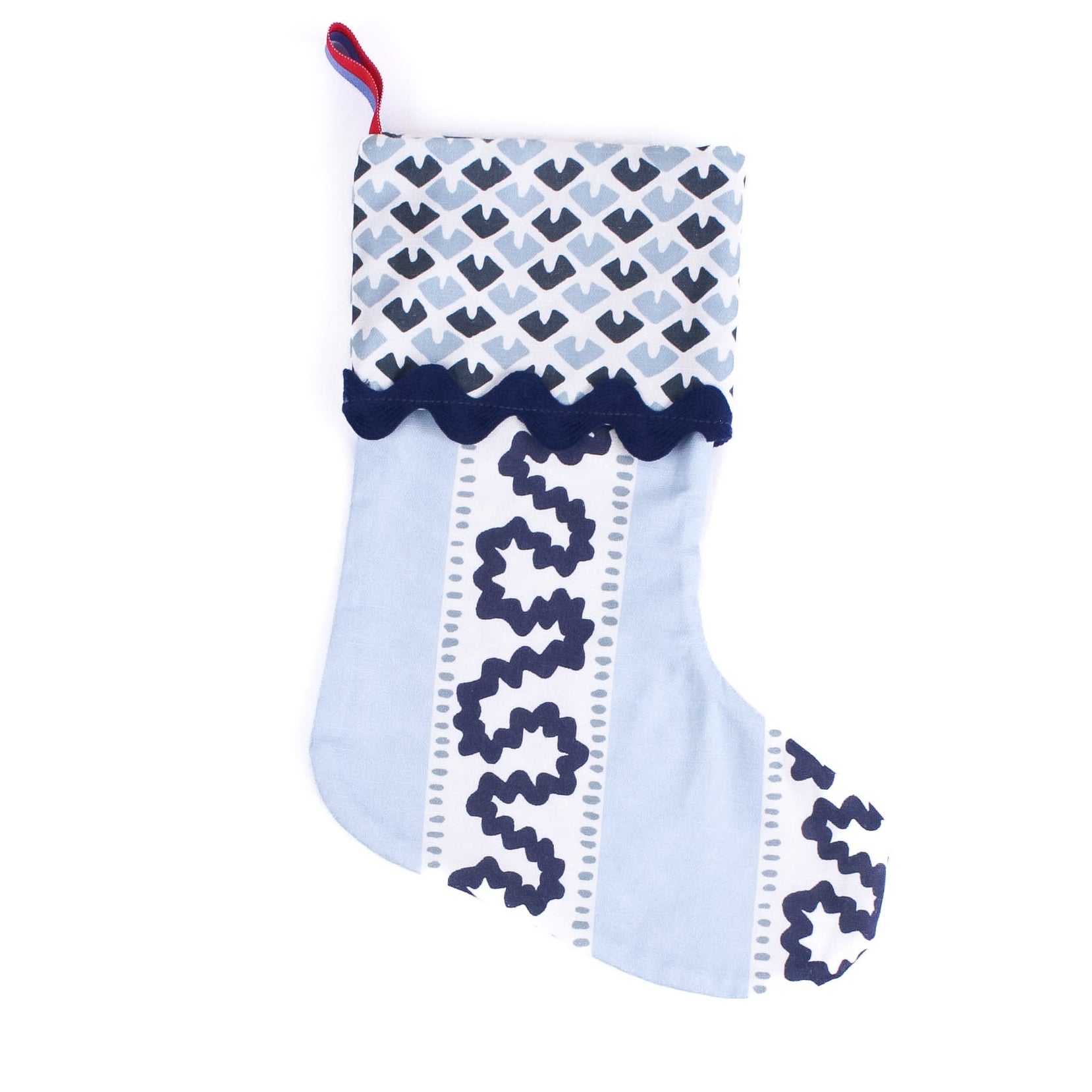 Blue Christmas stocking with blue and white striped pattern on a white background