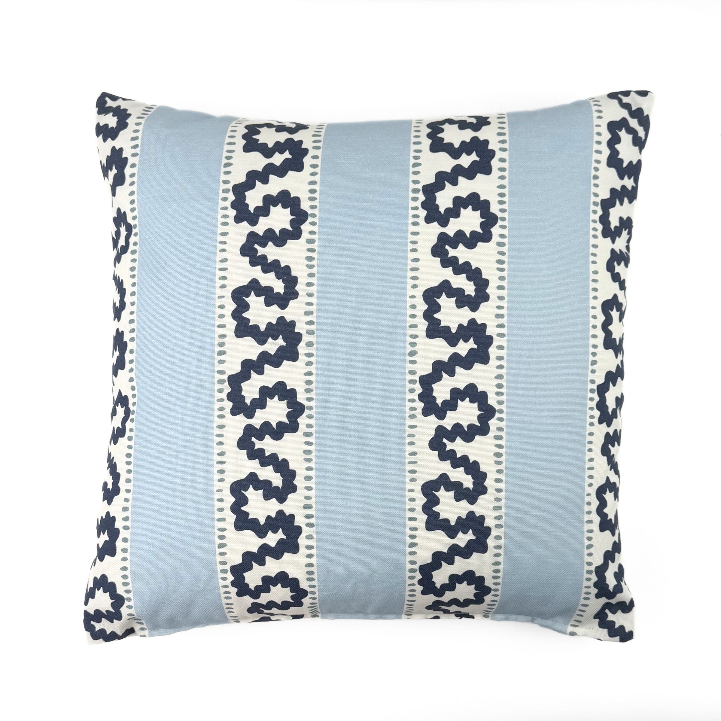 Harbor Trail outdoor pillow with white and blue coastal pattern.