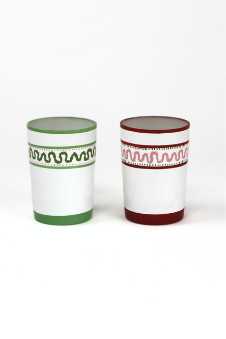 two painted glasses one green, one red with a squiggly motif at the top called "Harbor Trail" by madcap cottage