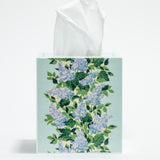 a blue floral tissue box cover with a repeating hydrangea pattern down the center of each side. 