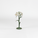 a large metal flower candle holder in the shape of a hydrangea on a white background