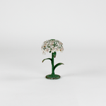 a small metal flower candle holder in the shape of a hydrangea on a white background