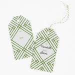 a gift tag with a geometric lattice pattern in green, with a space for personalized message.