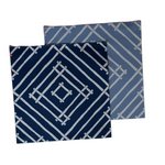 two square blue paper placemats with a white bamboo trellis design called "Island House" from Madcap Cottage.