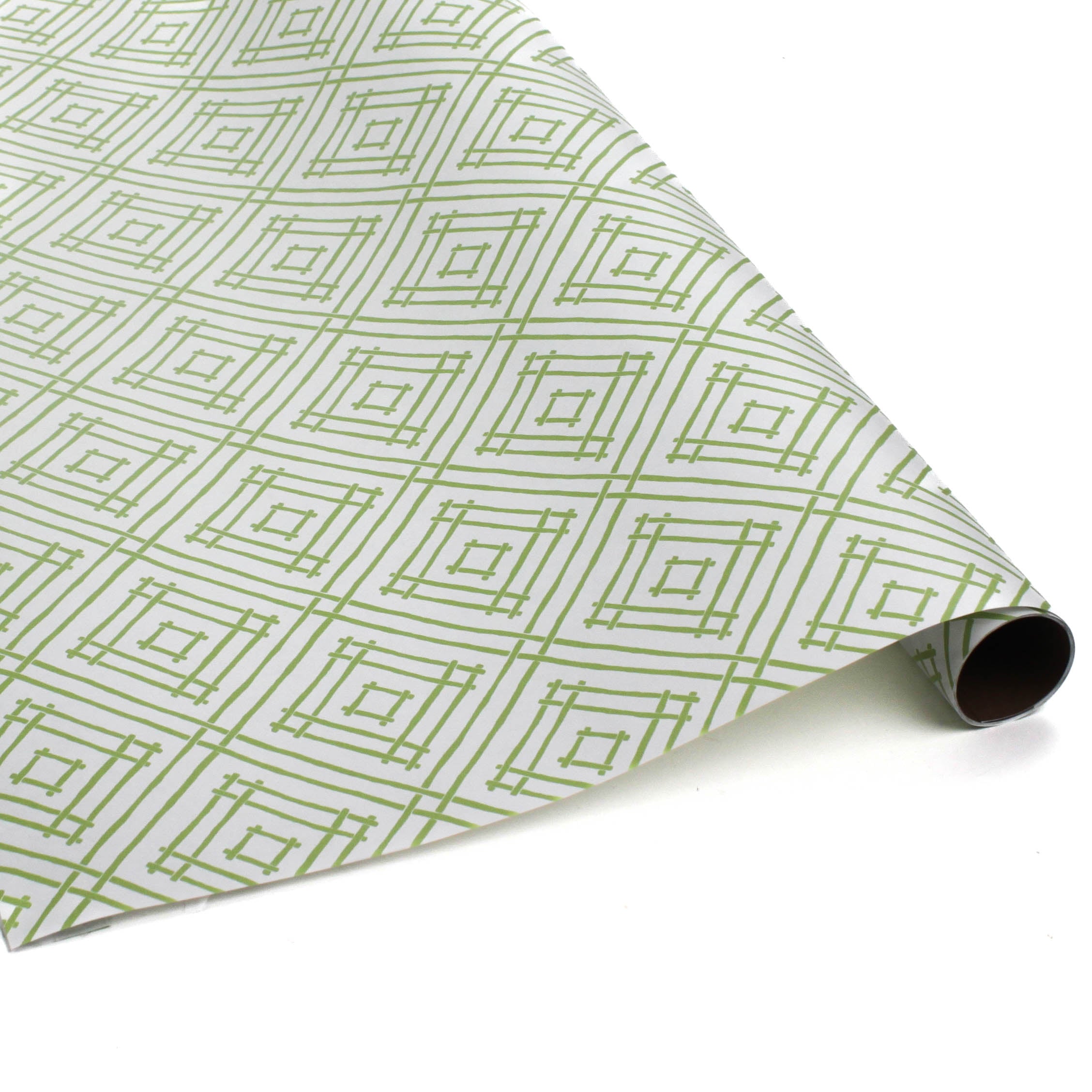 roll of a wrapping paper with a geometric lattice pattern in green