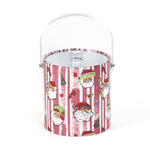 Jolly Santas is a pink and white stiped fabric with jolly santa motif on a 3 quart acrylic Christmas ice bucket