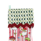 Pink Christmas stocking with Santa Claus design and a green cuff on a white background