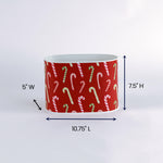 width of the Dancing Candy Canes Christmas caddy with a candy cane pattern, placed on a white background.