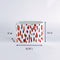 madcap Cottage large caddy with red abstract patterns on a white background dimensions