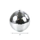 A large silver disco ball ornament measuring 10 inches wide, reflecting light with small mirror tiles, Christmas tea towel.