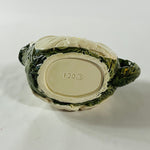 a large vintage daisy creamer with a large daisy forming the bottom of the pitcher. 