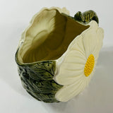 a large vintage daisy creamer with a large daisy forming the side of the pitcher. 
