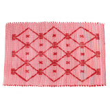 A red accent rug with a lattice pattern on it