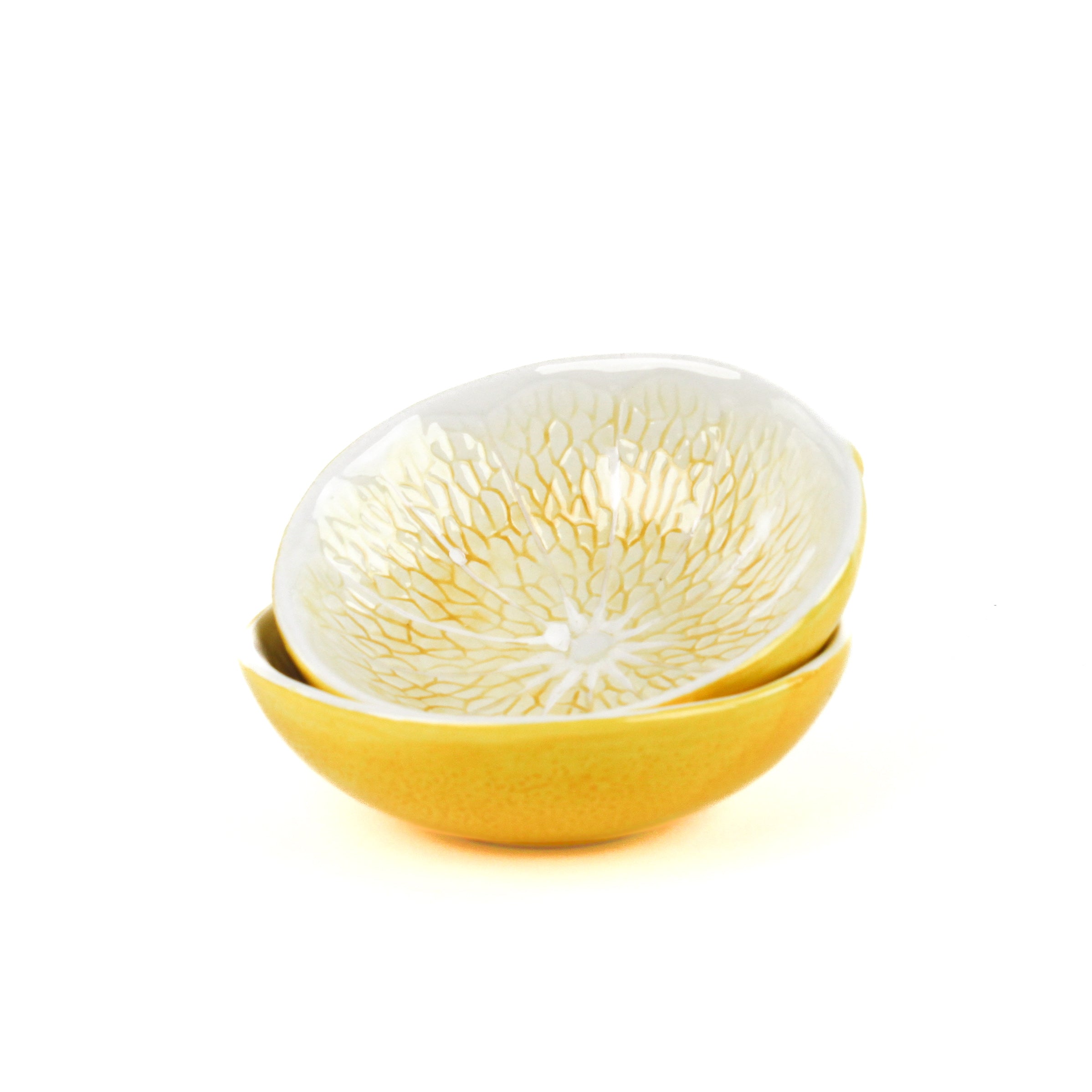 two stacked bowls that look like lemons against a white background. 