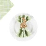 Gold bunny napkin ring holding a green lattice napkin on a white plate, charming holiday table accent perfect for Christmas tea towel styling, seasonal entertaining, and festive home décor