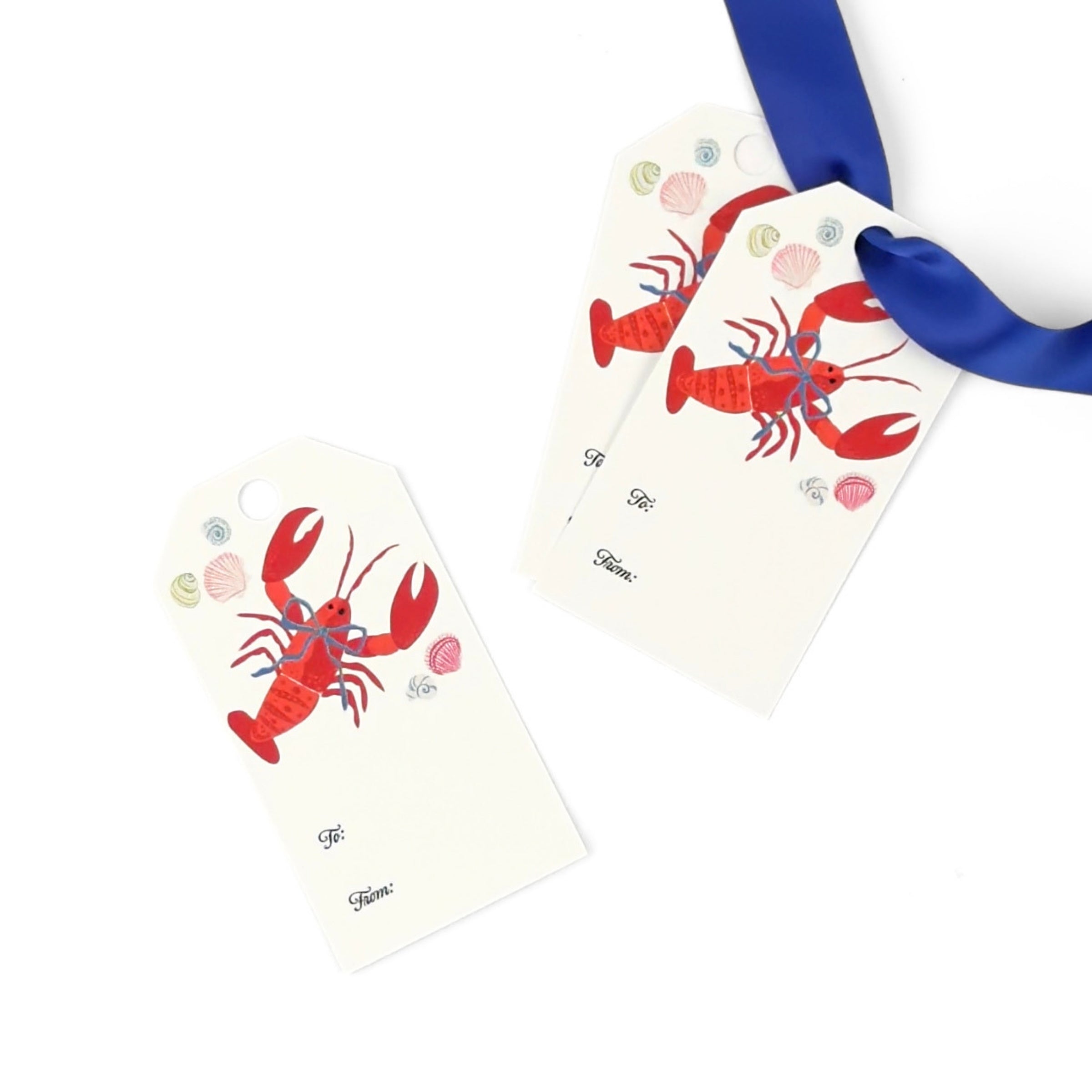 Coastal gift tags featuring a vibrant red lobster, delicate seashells, and personalized To and From fields.