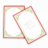 Christmas Flora Luxe notepad with red border and green floral design in white background