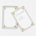 Christmas Holly notepad with pink border and green holly leaf design in a white background
