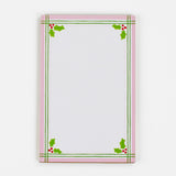 Christmas Holly notepad with pink border and green holly leaf design in a white background