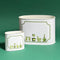 Empty duo of Garden Follies caddies in large and small on a green background