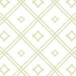 A green bamboo trellis wallpaper design on a white background from Madcap Cottage. 