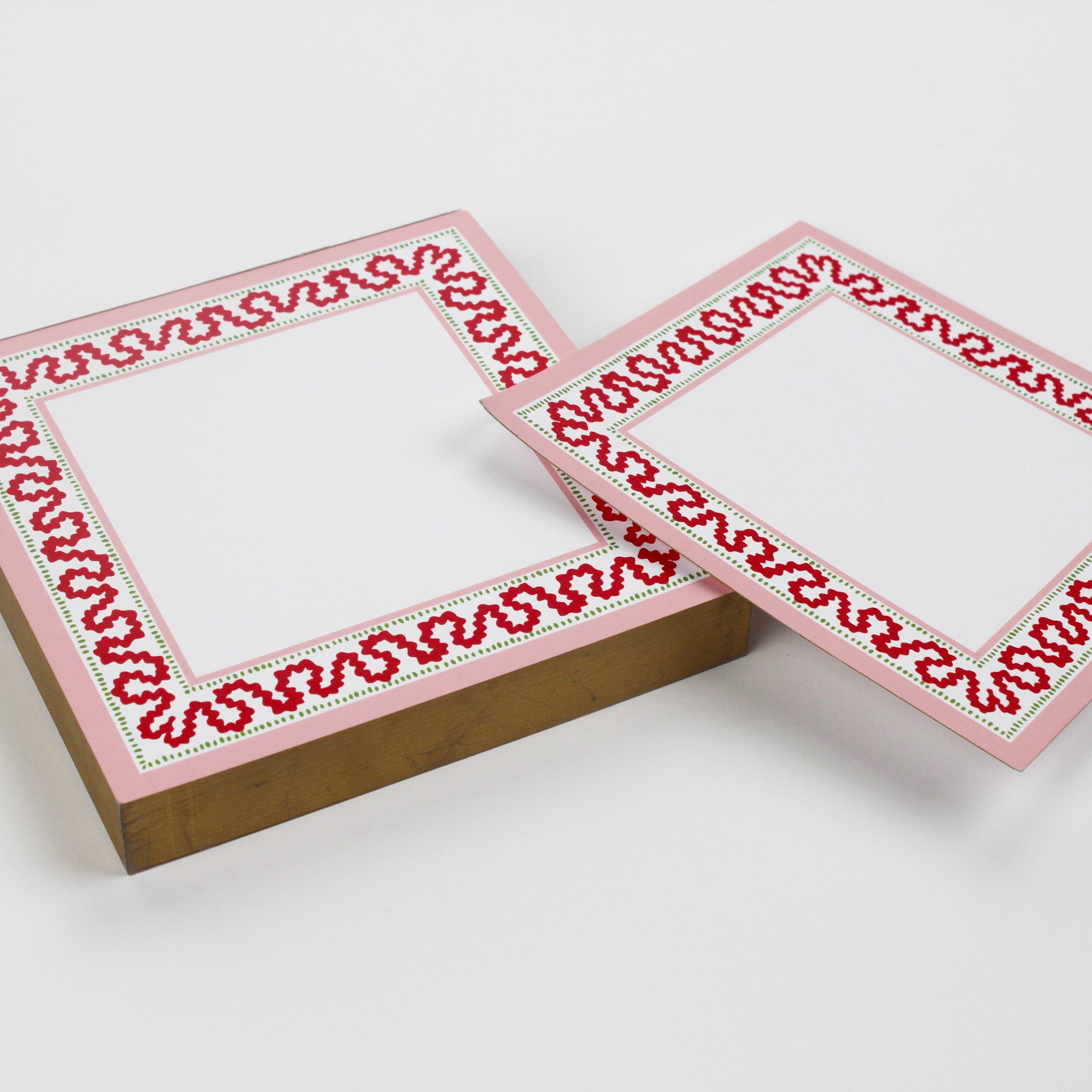 Square notepad with a decorative border and a placeholder graphic icon on a white background.