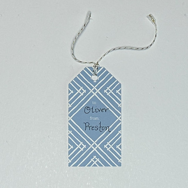gift tag with a geometric lattice pattern in blue, with a space for personalized message.