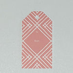 a gift tag with a geometric lattice pattern in pink, with a space for personalized message.