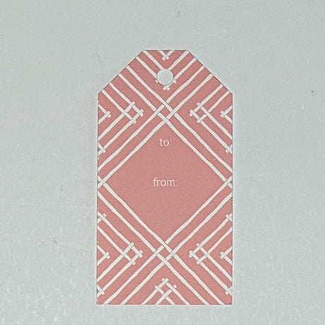 a gift tag with a geometric lattice pattern in pink, with a space for personalized message.