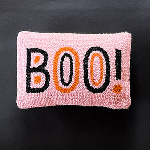 Madcap Cottage Pink halloween throw pillow with black and orange text that says Boo