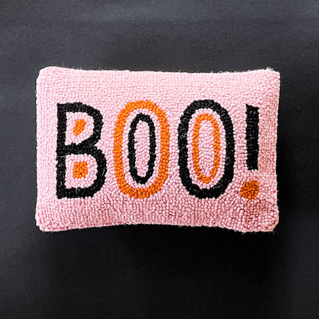 Madcap Cottage Pink halloween throw pillow with black and orange text that says Boo