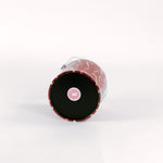 bottom of a Dancing Candy Canes, a red acrylic Christmas ice bucket covered in a candy can motif fabric