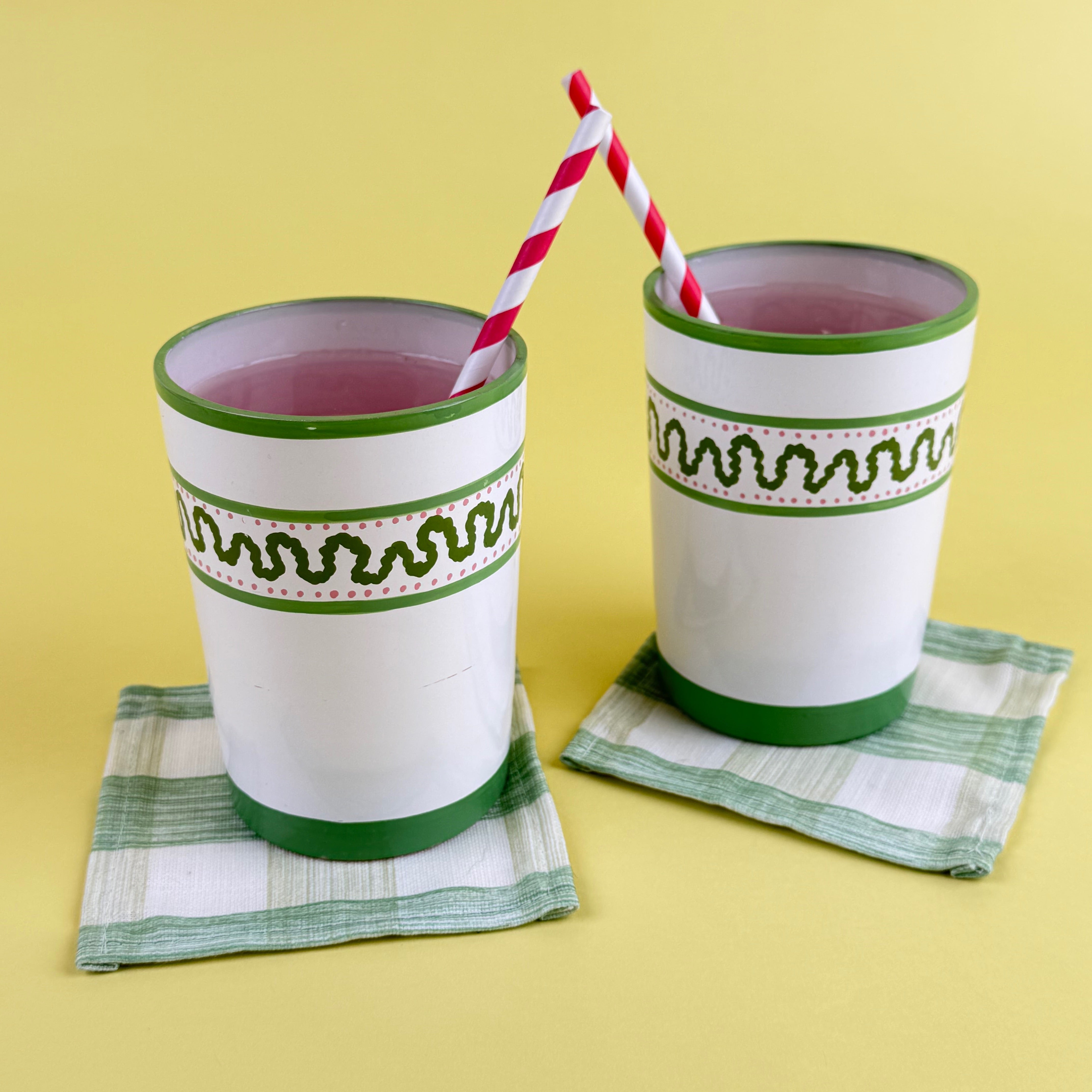 spring drinkware collection with patterned cups and straws.