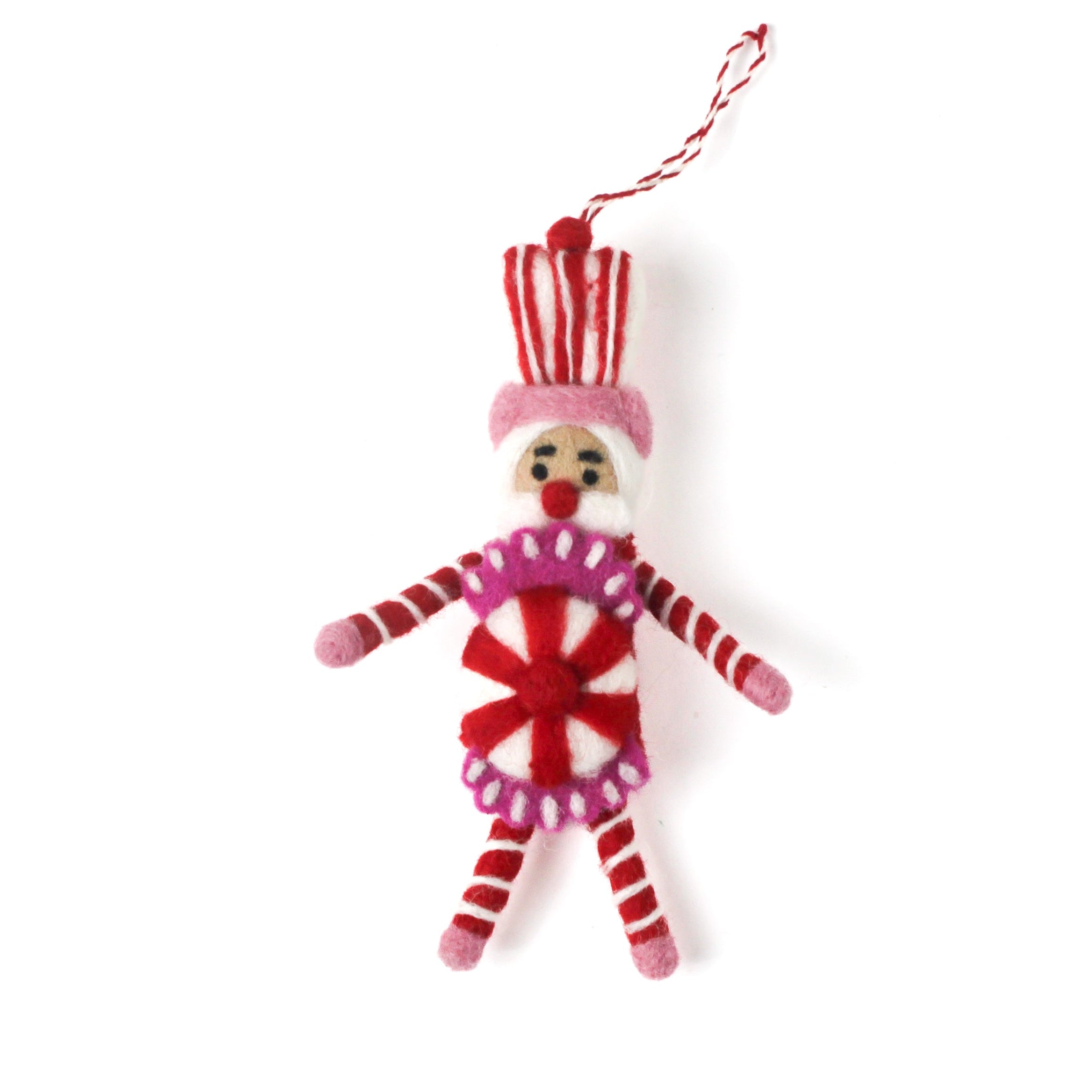 a madcap cottage Christmas felt nutcracker ornament in red and white striped outfit on a white background