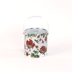 Cottage Grove Geranium is an acrylic ice bucket covered in red geranium fabric in white background