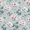 Geranium wallpaper featuring red, pink and white geraniums on a light blue background. 