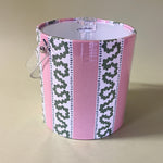 Agreen and pink striped ice bucket in madcap cottage's Harbor Trail Bahama Pink pattern.