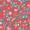 red, Blue and white chinoiserie wallpaper featuring blue and pink cherry blossom motifs on a red background. 