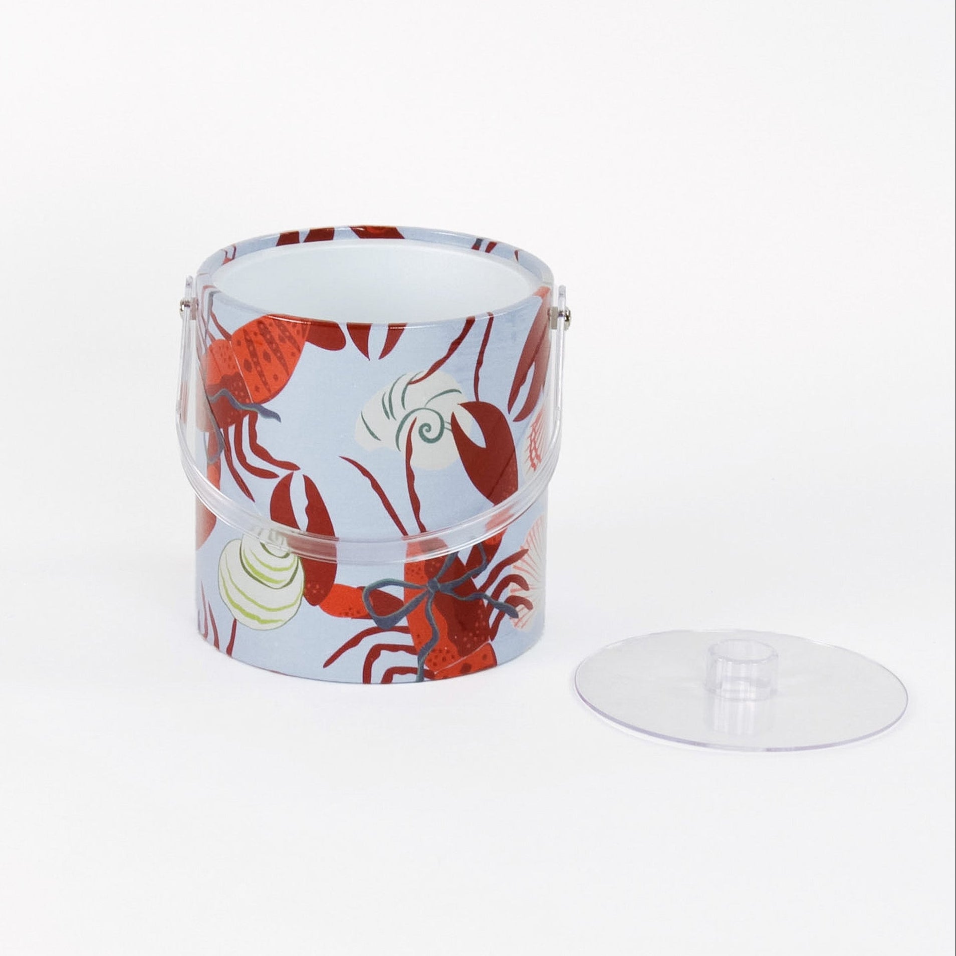 Rock Lobster red and blue ice bucket filled with ice and champagne features a green shell and red lobster print