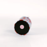 bottom of a Rock Lobster red and blue ice bucket filled with ice and champagne features a green shell and red lobster print