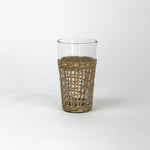 a seagrass wrapped glass from madcap cottage 