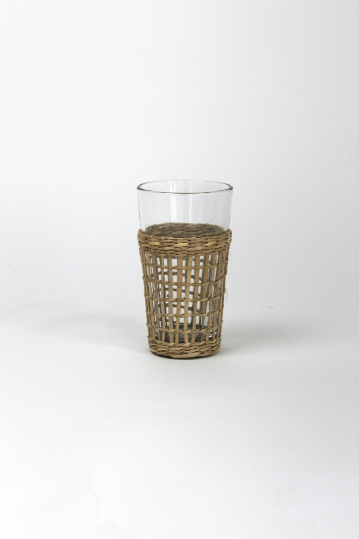 a seagrass wrapped glass from madcap cottage 
