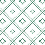 A green bamboo trellis wallpaper design on a white background from Madcap Cottage. 