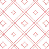 A pink bamboo trellis wallpaper design on a white background from Madcap Cottage. 
