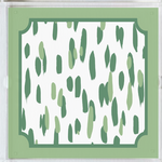 Close-up view of Club House square green acrylic tray. Two tones of green brushstrokes with a border of green