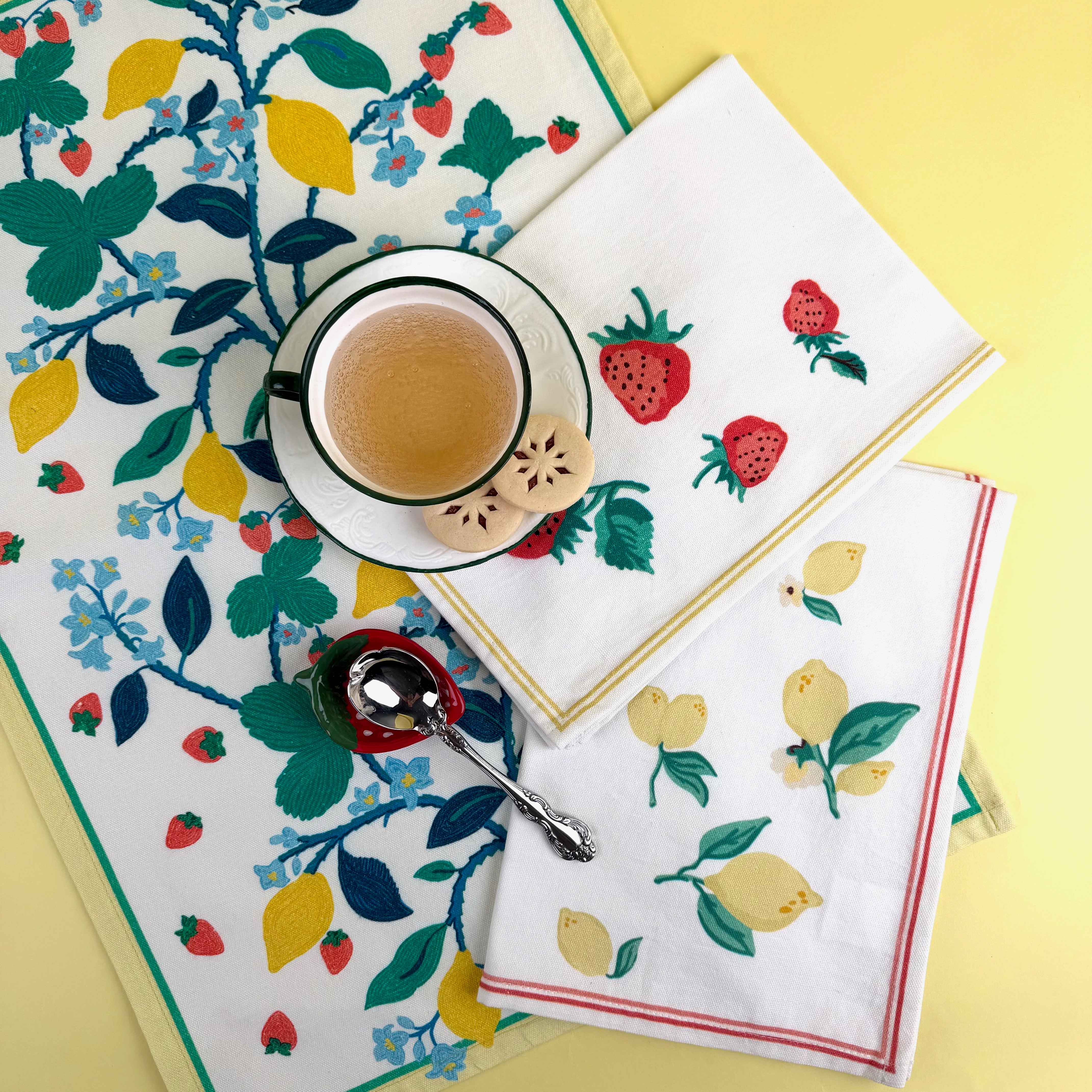 spring tea towels with fruit and floral patterns.