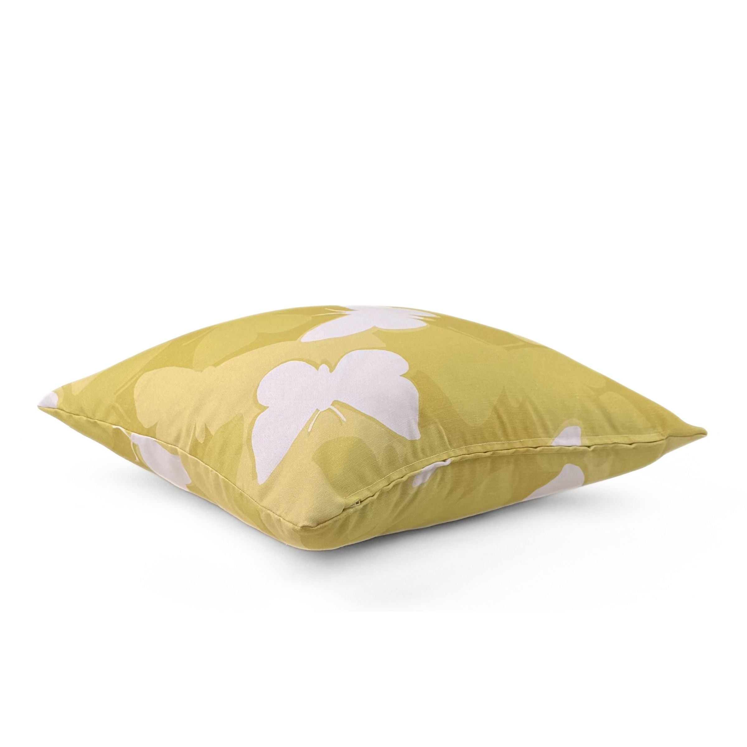 Side view of Meadow Morn White Butterfly outdoor pillow.