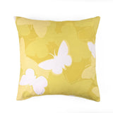Meadow Morn outdoor pillow with white butterfly pattern on daffodil yellow.