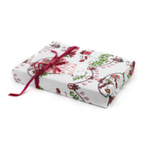 Cute Christmas wrapping paper decorated with white dancing mice holding ornaments and gift bags.