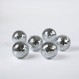 six silver disco ball christmas ornaments on a white background